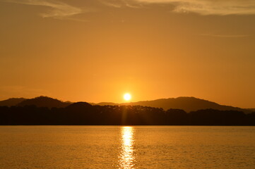 Naklejka premium Sunset over the Nicaraguan lakes outside of Léon in Central America