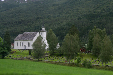 Fototapeta premium norwegian church with cemetery
