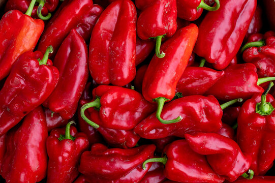  Close up of fresh organic red paprika on a market stall