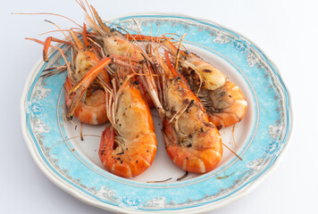 grilled shrimps on white background.