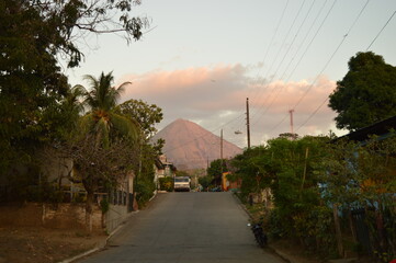 Fototapeta na wymiar Sunset over the volcanic islands Isla Ometepe and the volcanoes of Léon in Nicaragua, Central America