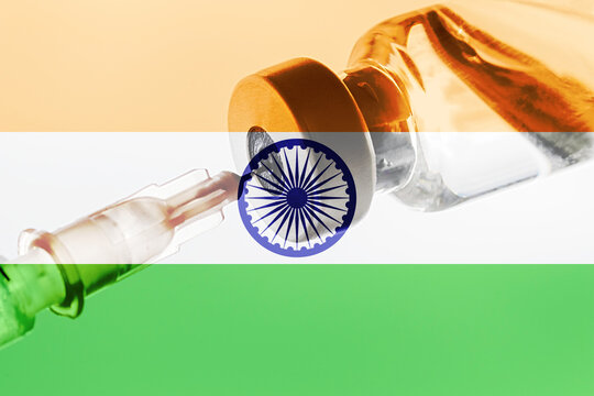 India Vaccination, Coronavirus, Covid-19,Sars-Cov-2, India flag, Vaccine vial dose, needle syringe, concept vaccination, disease care, prevention immunization