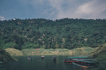 Naklejka premium Passenger boats for tourism are parked in the river