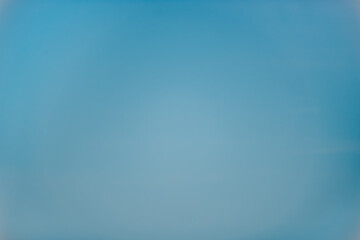 The background picture of blue color in a soft tone. There is a smooth and clean surface with low contrast. Feeling calm, cold, relax, and comfortable. The idea for simply wallpaper with copy space.