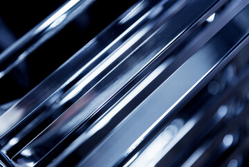 Abstract industrial background of metal pipes construction.