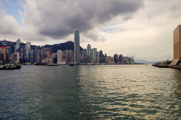 Boat and ship traffic in bay of Victoria Harbor Hong Kong, China with Hongkong Central city skyline...