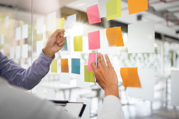 Business sales consultant discussing in data documents at modern office.