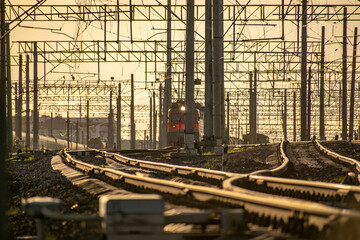Fototapeta na wymiar Railroad tracks for moving locomotives and trains with loads.