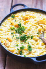 Pumpkin and sweet corn risotto with ricotta, parmesan and parsley