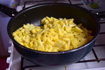 Cooking delicious potatoes in a frying pan