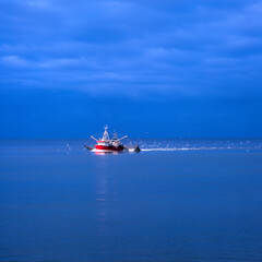 Fototapeta premium The picturesque shrimp cutters are a characteristic picture of the North Sea Wadden Sea coast
