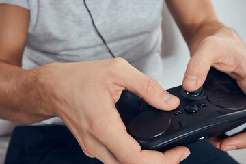 Gamepad male hands close-up video game addiction office technology