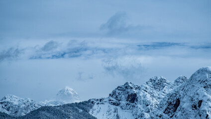 Trekking after a snowfall in the Julian Alps, Friuli-Venezia Giulia, Italy