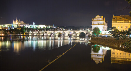 Fototapeta na wymiar Pargue charles bridge and prague castle by night reflections river