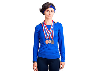 Beautiful young woman with short hair wearing winner medals thinking attitude and sober expression looking self confident