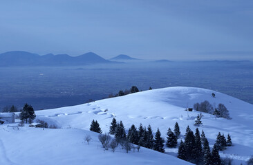Fototapeta na wymiar Mountain landscape at evening with snow