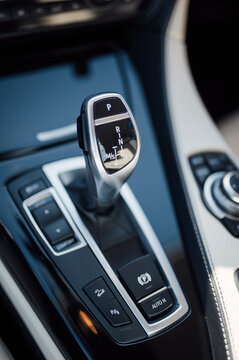gear knob in a luxury car with beige leather