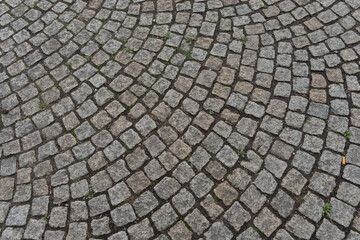 Background of arched laid cobblestone pavement