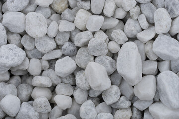 White marble pebble stone wall background