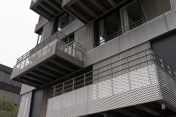 Bremen, Germany - August 17, 2019: close-up of modern steel glass facade of a business building...