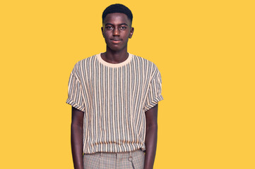 Young african american man wearing casual clothes skeptic and nervous, disapproving expression on...