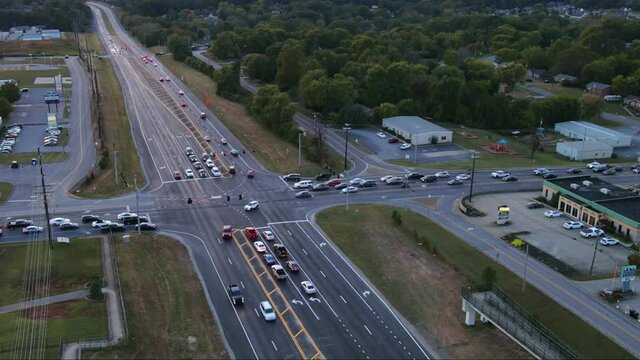 Time lapse at a busy intersection during twilight