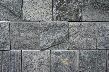 Background wall made of gray stone texture.
