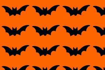 Naklejka premium Background Halloween Black Bats Orange Background Seamless Pattern