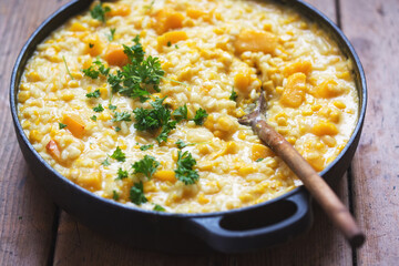 Pumpkin and sweet corn risotto with ricotta, parmesan and parsley - 384598960
