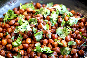 Indian chickpea dish(chana masala) with coriander laves garnish on top