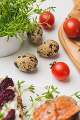 ingredients: tomatoes, quail eggs, fresh herbs, red fish, cheese and bread

