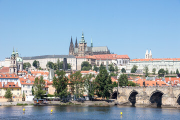 Charles bridge and prague castle sunny panorama old town
