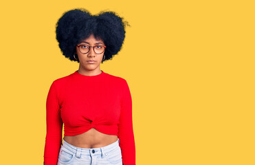 Young african american girl wearing casual clothes and glasses depressed and worry for distress, crying angry and afraid. sad expression.