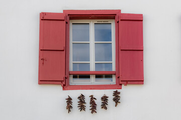 Espelette chillies dried on a facade