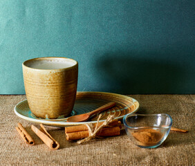 Traditional Turkish drink sahlep with cinnamon sticks