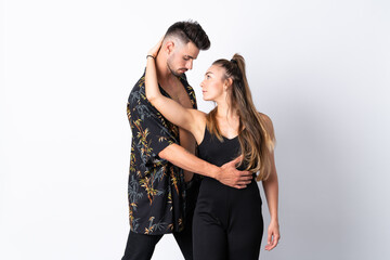 Couple dancing over isolated white background