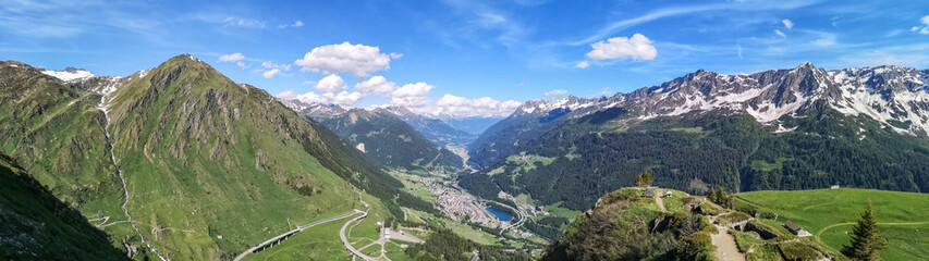 Fototapeta na wymiar Ultra wide panorama from the Gotthardpass in Switzerland