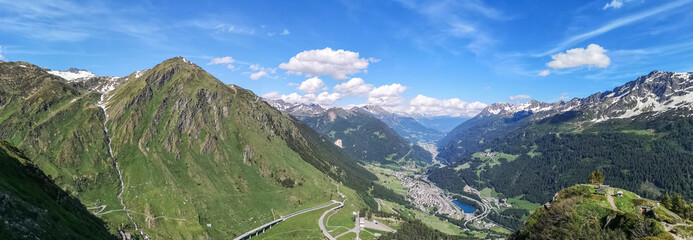 Fototapeta na wymiar Ultra wide panorama from the Gotthardpass in Switzerland