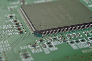 Fototapeta premium Microchips on a circuit board. Electrical, system.