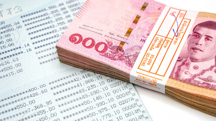 bank account and money thailand 100 baht. finance concept.book bank.
