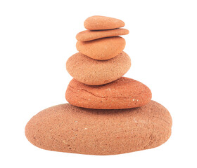 Balanced red stones isolated on a white background. Zen stones. Spa concept.
