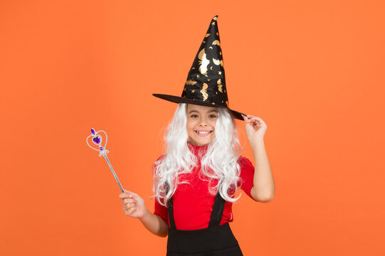 Happy Witch Child With Magic Wand Wear Costume Of Wizard On Halloween Party, Halloween Magic