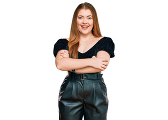Young beautiful redhead woman wearing elegant clothes happy face smiling with crossed arms looking at the camera. positive person.