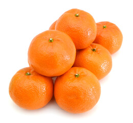Mandarin isolated on white background, pyramid of mandarins on white background, stack of mandarins. Conceptual photo. Exotic tropical fruit