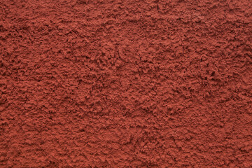 Dark orange decorative facade embossed plaster of external walls