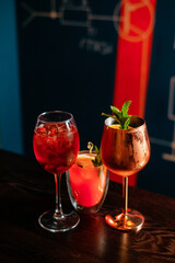 Set of exotic tropical cocktail with apple and mint on the bar counter.
