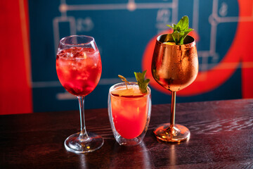 Set of exotic tropical cocktails with apple and mint on the bar counter. Making cocktails at home like an expert nightclub barman.