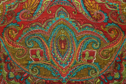 Bright Indian pattern on a silk scarf.