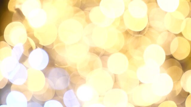 Abstract bokeh lights with soft light background. Lights of garland.