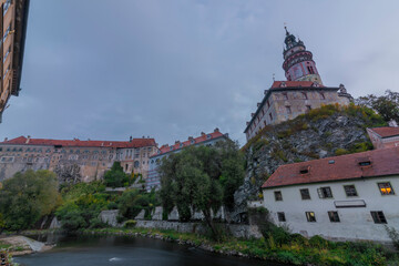 Cesky Krumlov old town with Vltava river and bridges in autumn color morning